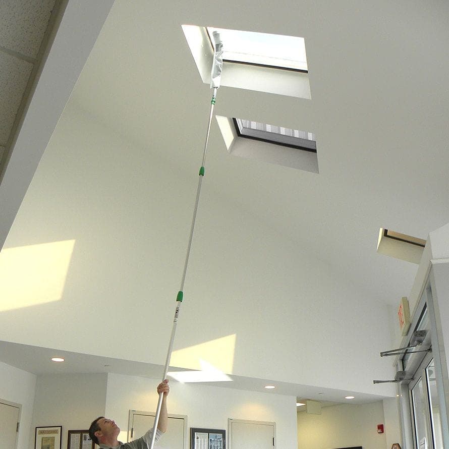 Dusting a high ceiling and beams with extension tooling