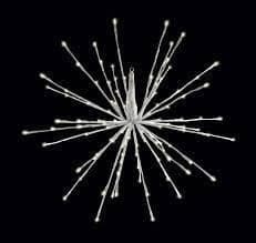 A pure white spritzer starburst lit against a dark background.