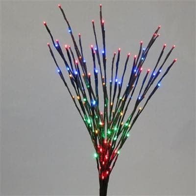 A bundle of lit twig branches with multicolor LED tips.