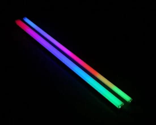 Two linear RGB light bars lit in a blue through green gradient against black.