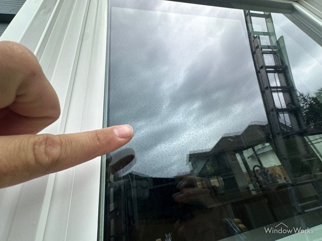 Hard water and mineral spotting on residential glass, from the WindowWorks What's on my windows guide