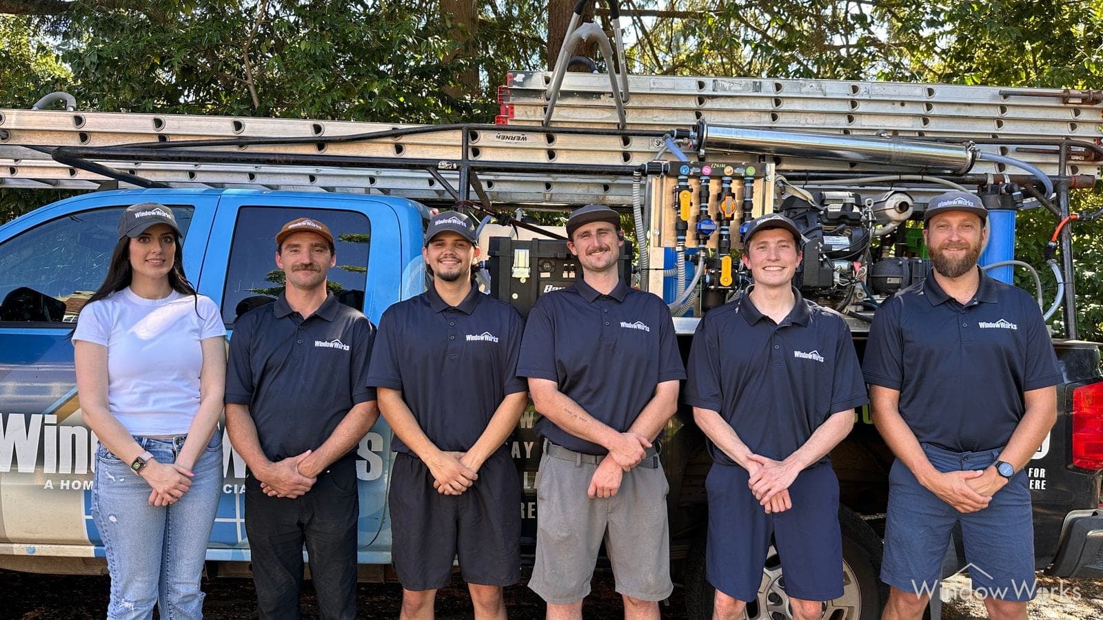 The WindowWorks crew of insured, background-checked technicians in front of their soft-wash truck, serving the Eastside and Greater Seattle